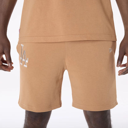 The Male model is wearing LA Dodgers MLB League Essential Dark Beige Shorts 7
