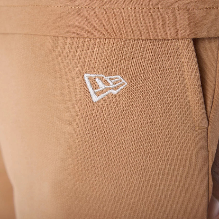 The Male model is wearing LA Dodgers MLB League Essential Dark Beige Shorts 5