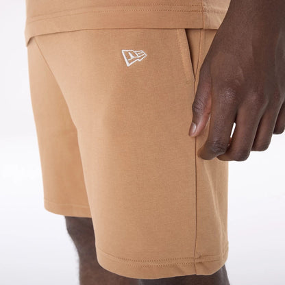 The Male model is wearing LA Dodgers MLB League Essential Dark Beige Shorts 3