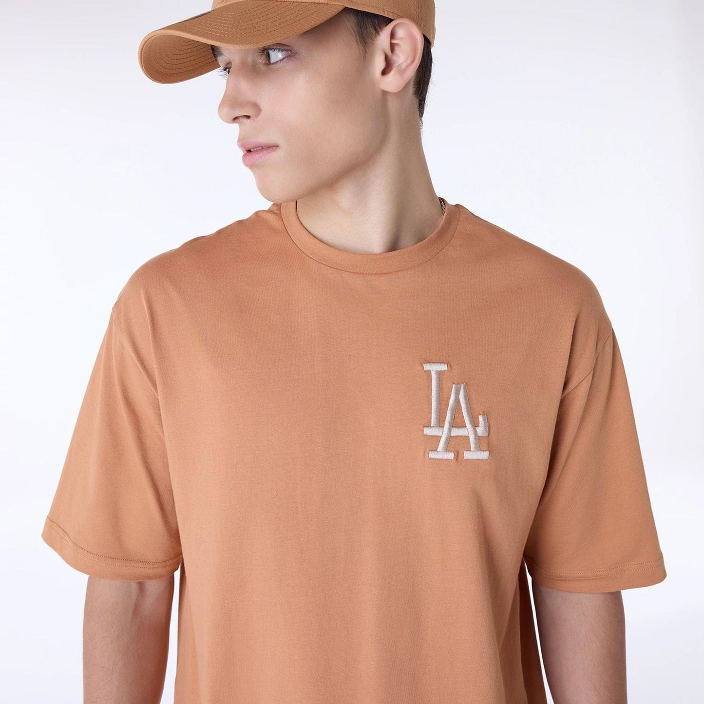 The Male model is wearing LA Dodgers MLB League Essential Dark Beige Oversized T-Shirt 5