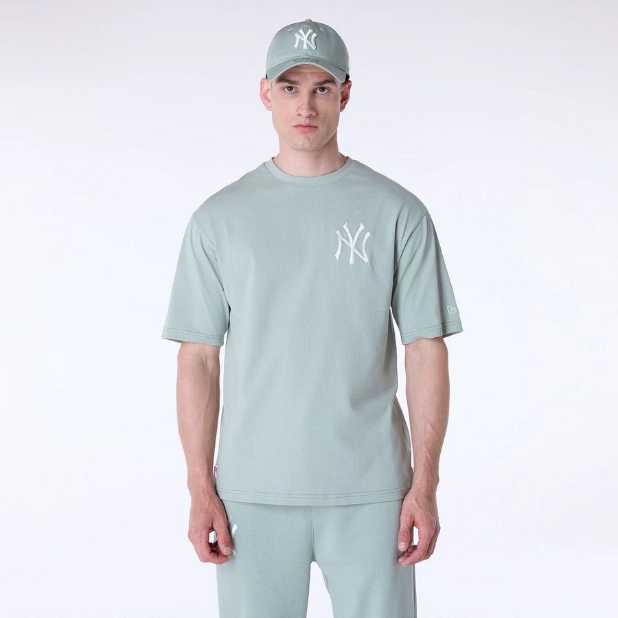 The Male model is wearing New York Yankees MLB League Essential Pastel Green Oversized T-Shirt 1