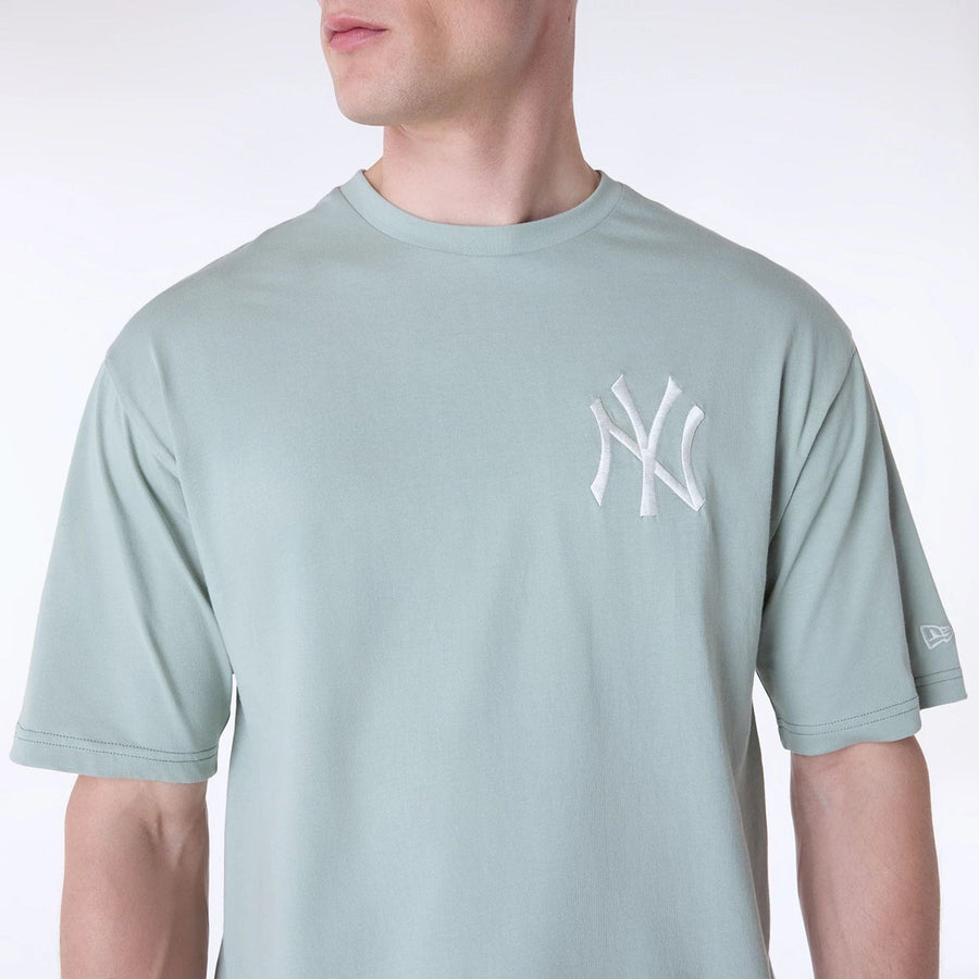 The Male model is wearing New York Yankees MLB League Essential Pastel Green Oversized T-Shirt 3