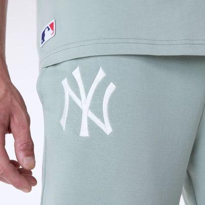 The Male model is wearing New York Yankees MLB League Essential Pastel Green Fleece Joggers 4