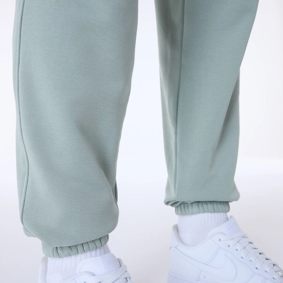 The Male model is wearing New York Yankees MLB League Essential Pastel Green Fleece Joggers 5