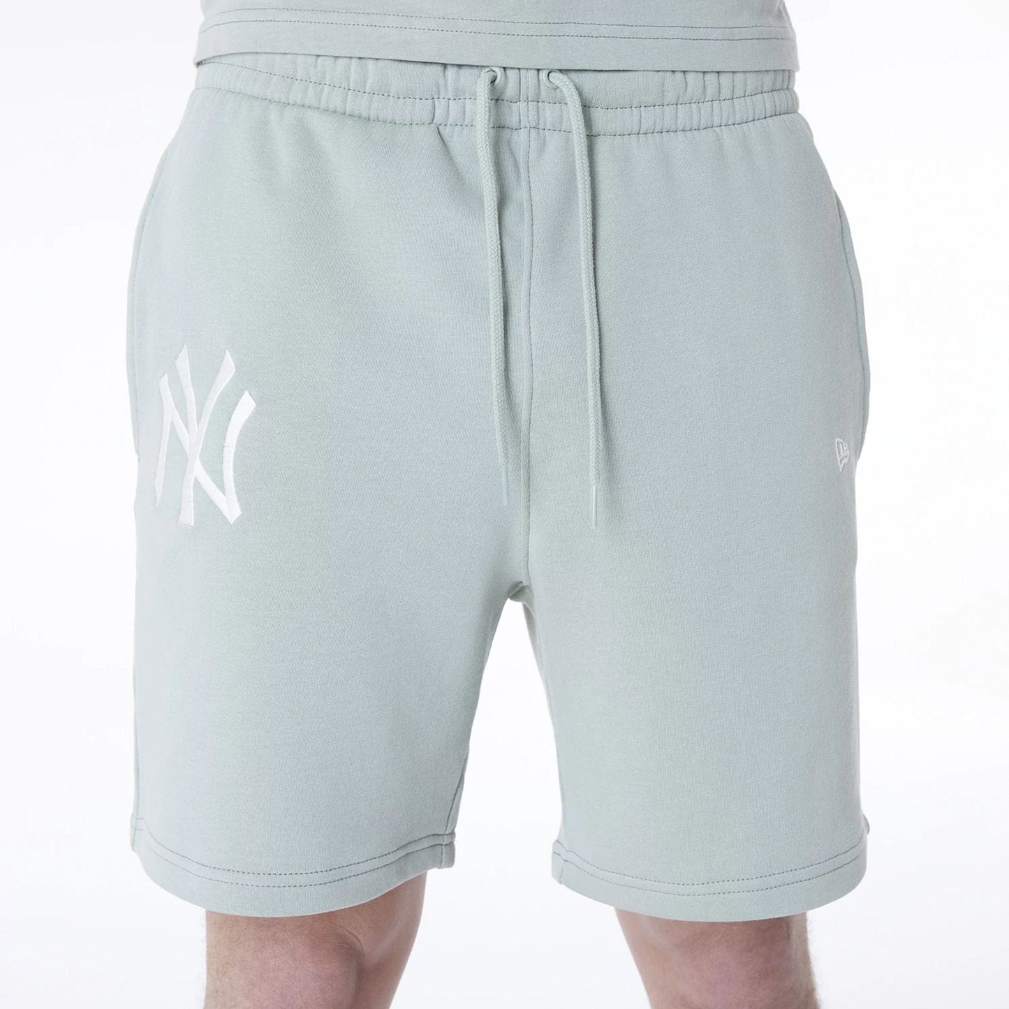 The Male model is wearing New York Yankees MLB League Essential Pastel Green Shorts 6
