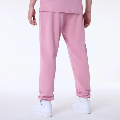 The Male model is wearing New York Yankees MLB League Essential Dark Pink Fleece Joggers 2