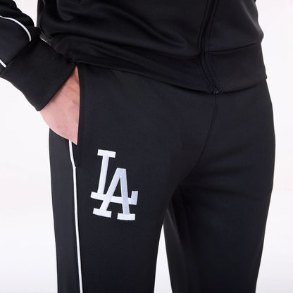 The Male model is wearing LA Dodgers MLB Track Pants Black Fleece Joggers 5