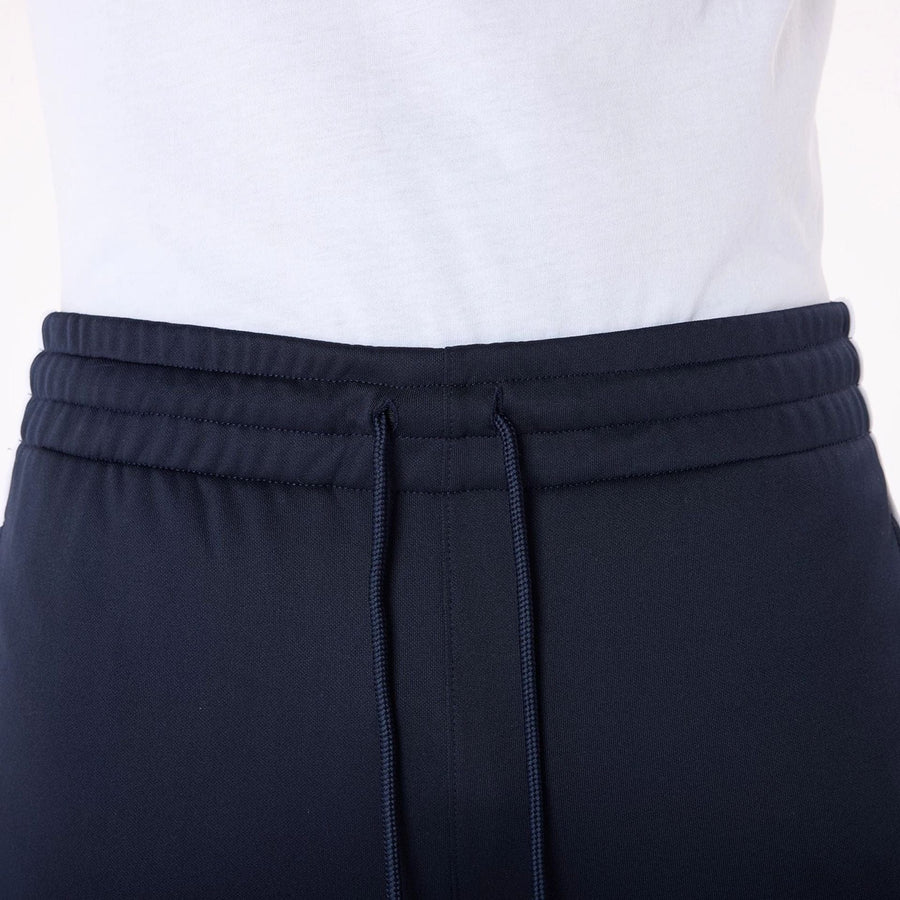 The Male model is wearing New York Yankees MLB Track Pants Navy Fleece Joggers 5