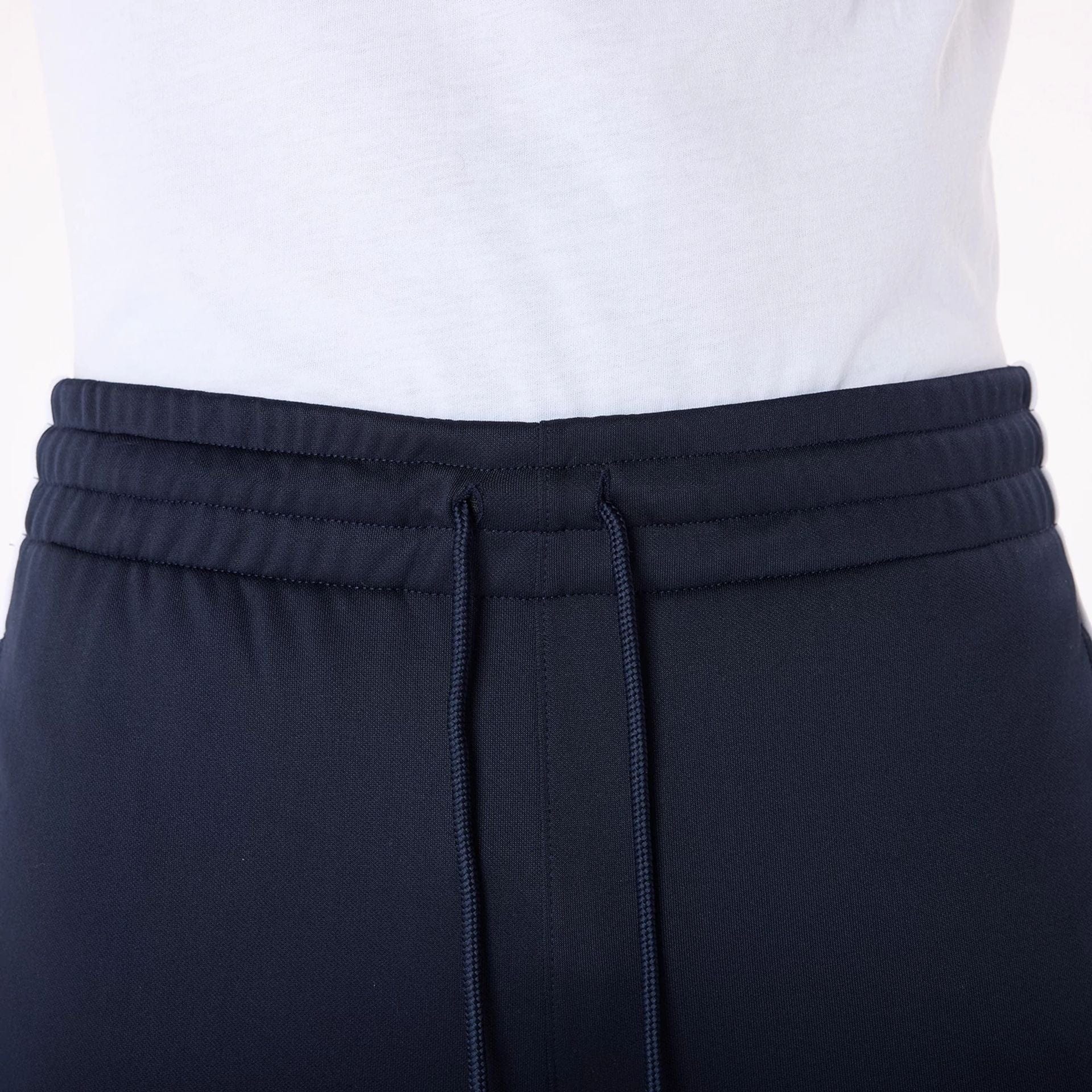 The Male model is wearing New York Yankees MLB Track Pants Navy Fleece Joggers 5