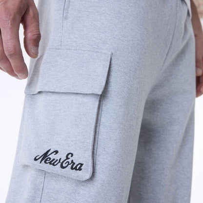 The Male model is wearing New Era Script Grey Fleece Joggers 4