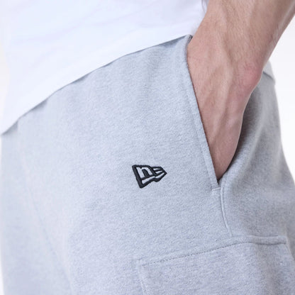 The Male model is wearing New Era Script Grey Fleece Joggers 7