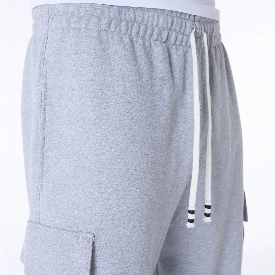 The Male model is wearing New Era Script Grey Fleece Joggers 3