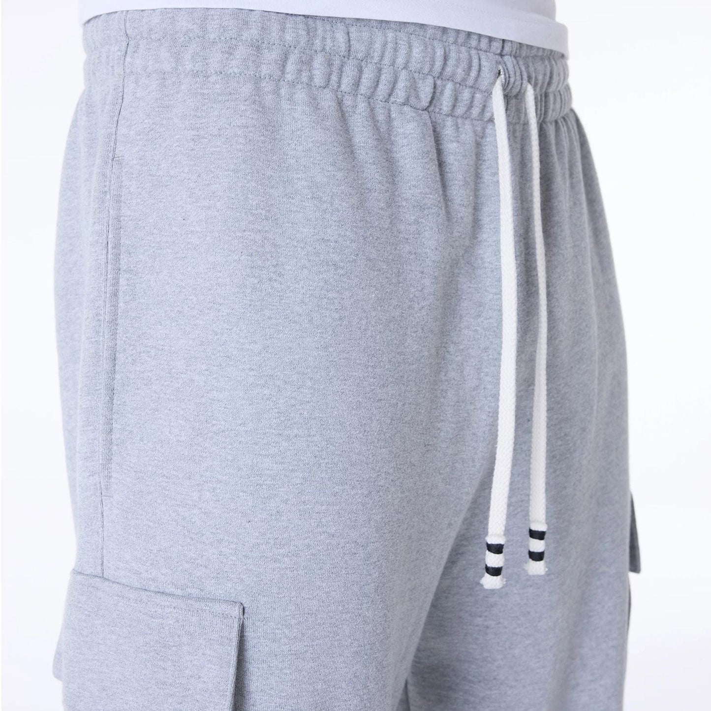 The Male model is wearing New Era Script Grey Fleece Joggers 3