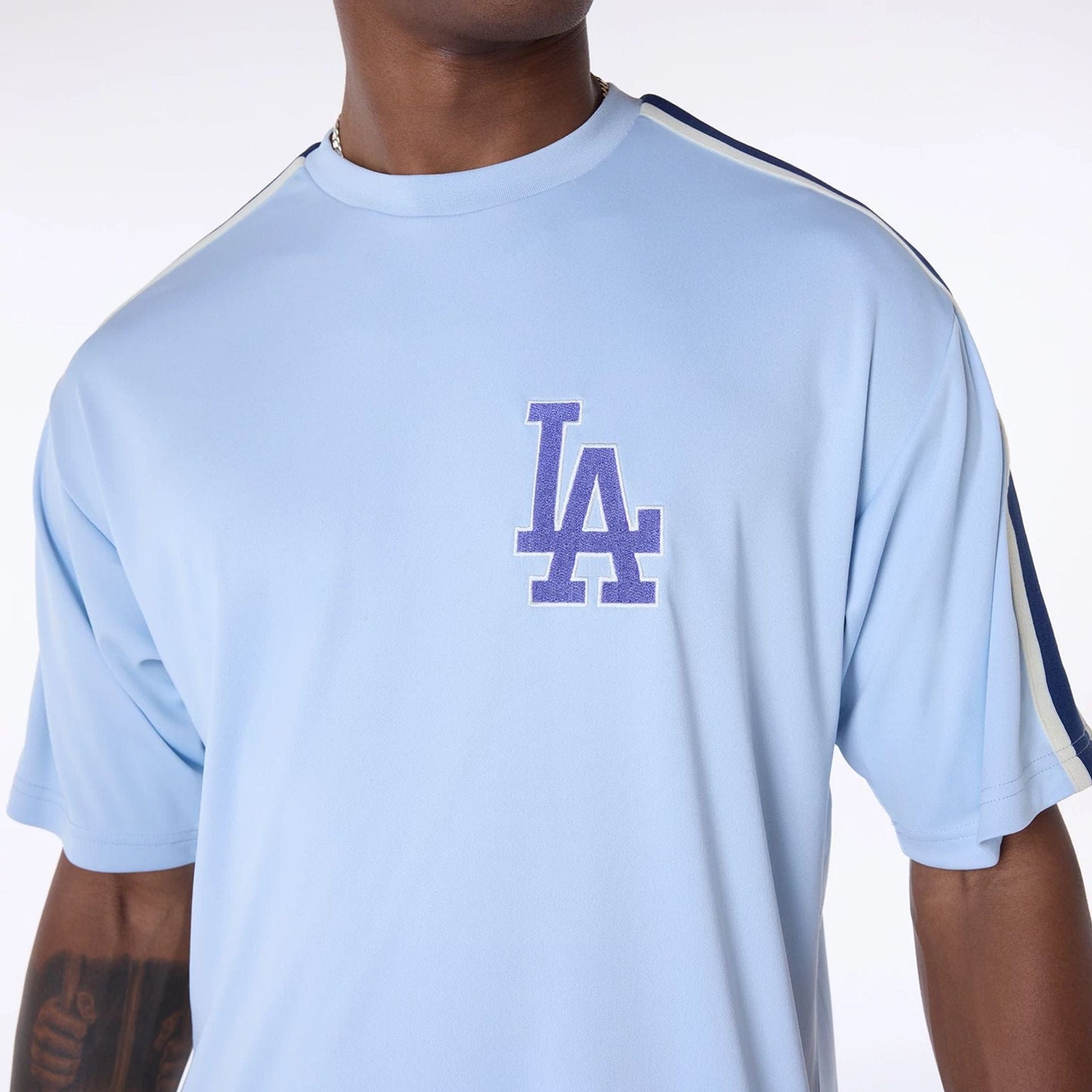 The Male model is wearing LA Dodgers MLB Floral Pastel Blue Oversized T-Shirt 8
