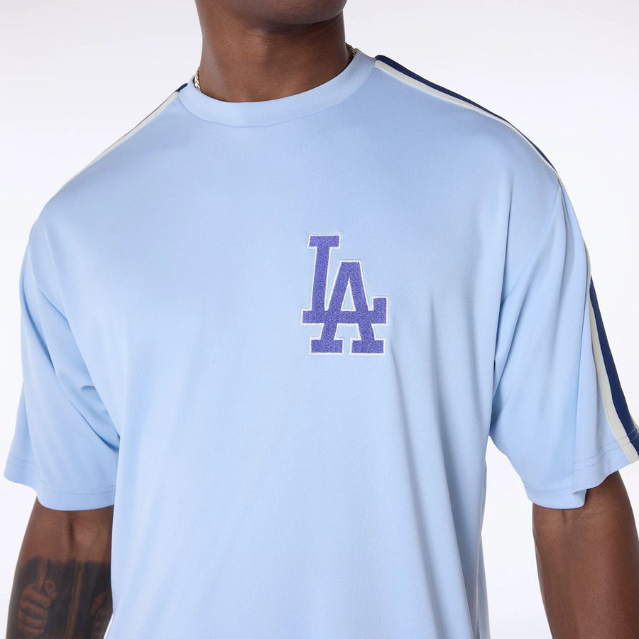The Male model is wearing LA Dodgers MLB Floral Pastel Blue Oversized T-Shirt 8