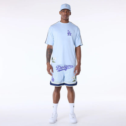 The Male model is wearing LA Dodgers MLB Floral Pastel Blue Oversized T-Shirt 4