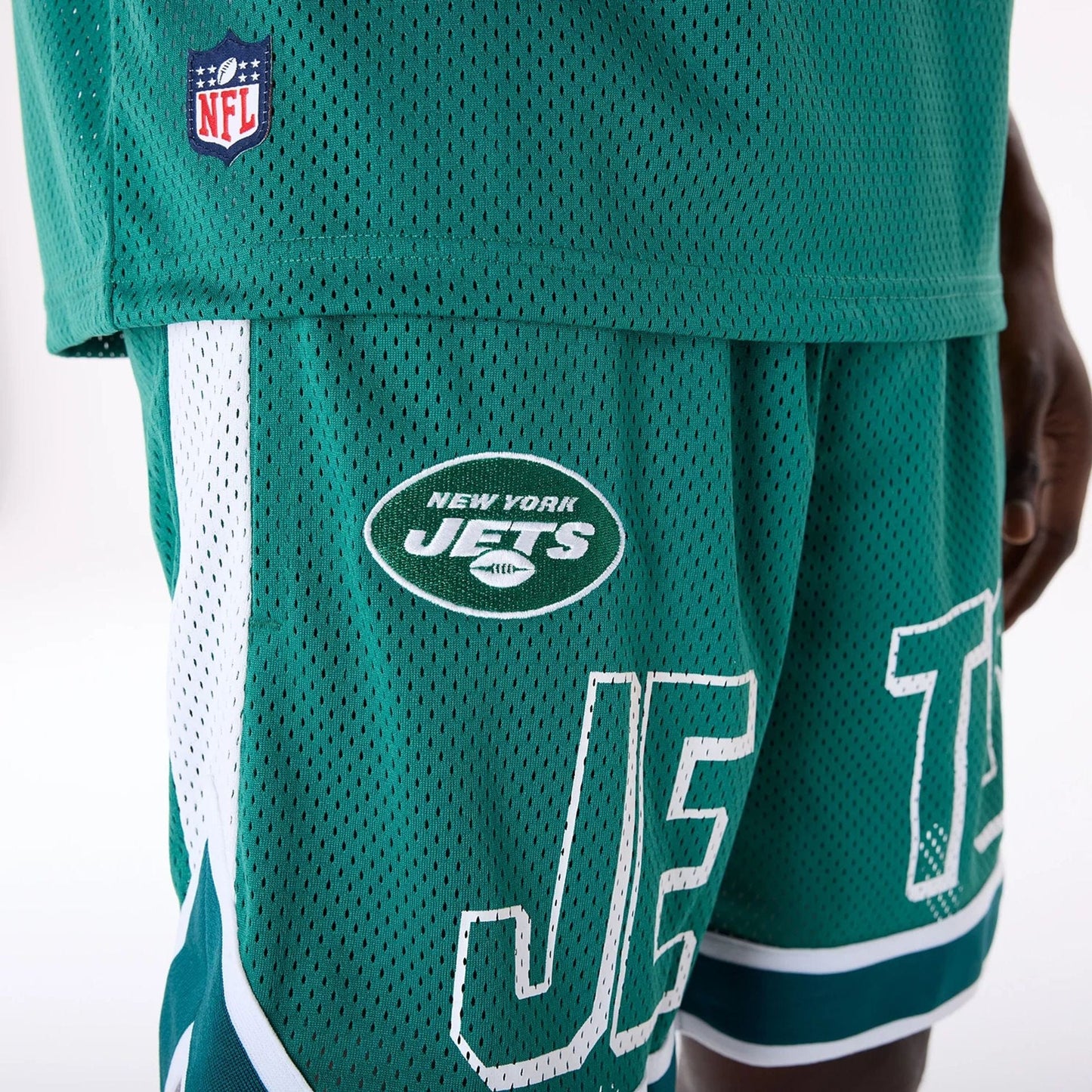 The Male model is wearing New York Jets NFL Mesh Green Shorts 7