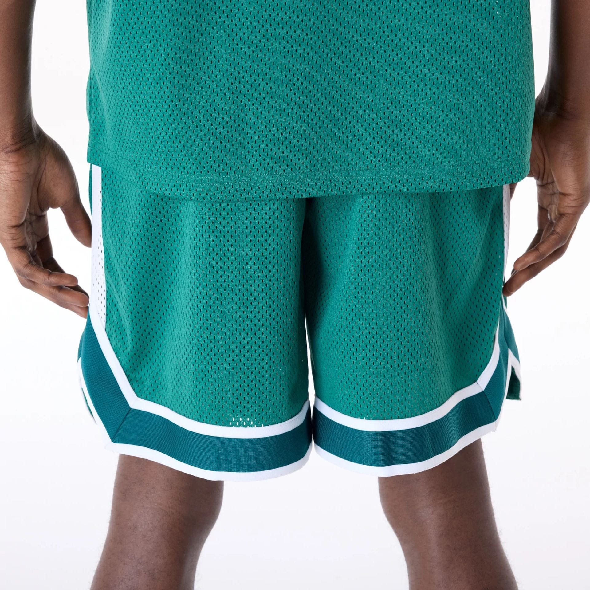 The Male model is wearing New York Jets NFL Mesh Green Shorts 6