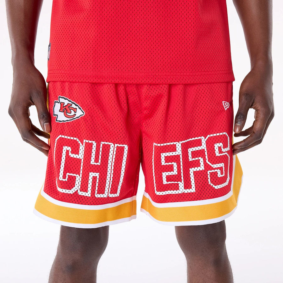 The Male model is wearing Kansas City Chiefs NFL Mesh Red Shorts 7