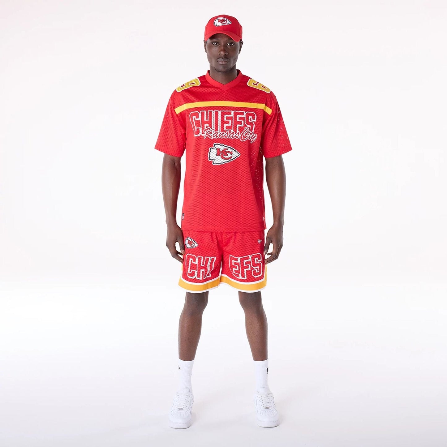 The Male model is wearing Kansas City Chiefs NFL Mesh Red Shorts 4