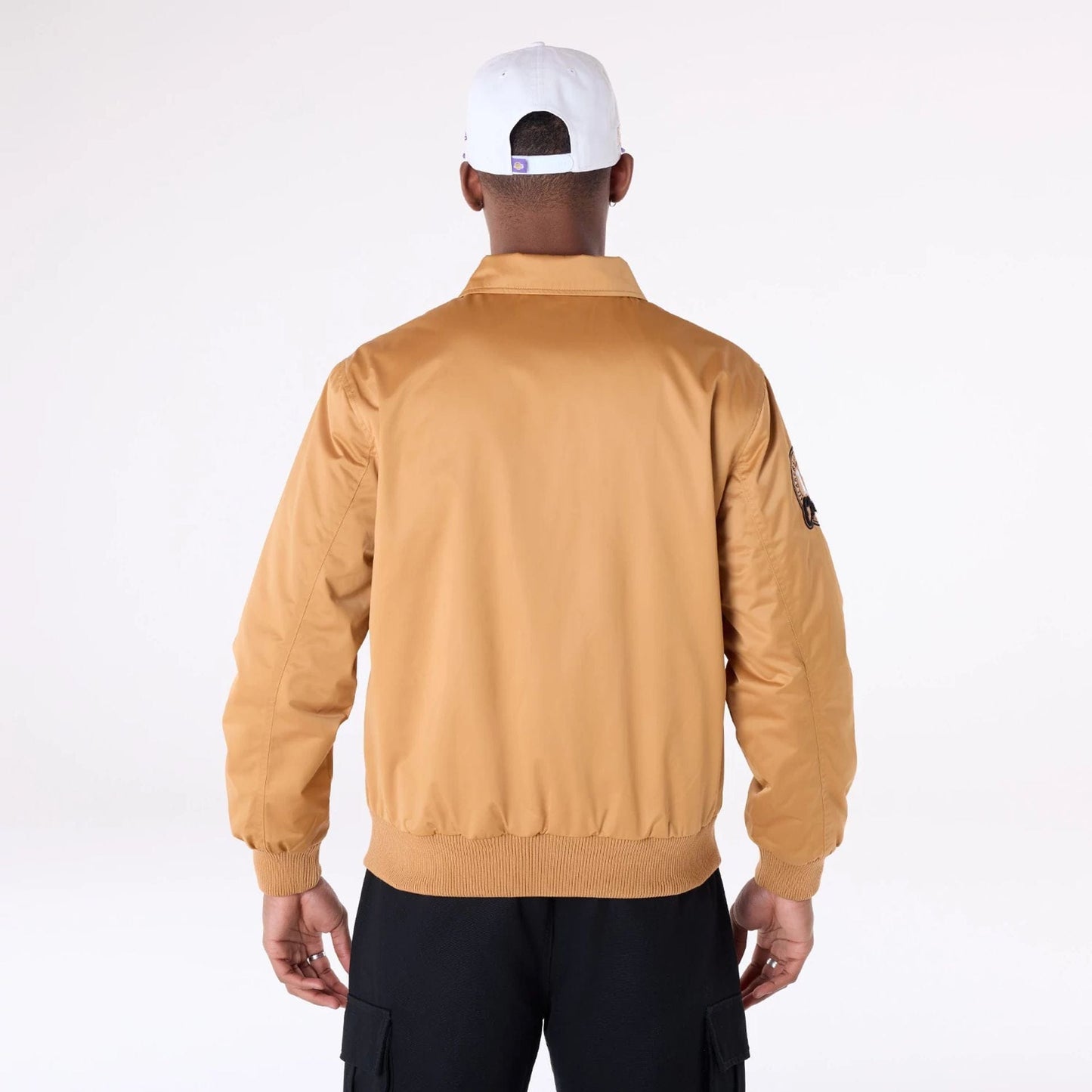 The Male model is wearing LA Lakers NBA Floral Dark Beige Jacket 2