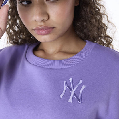 The Female model is wearing New York Yankees Womens MLB League Essential Purple Crew Neck Sweater 8
