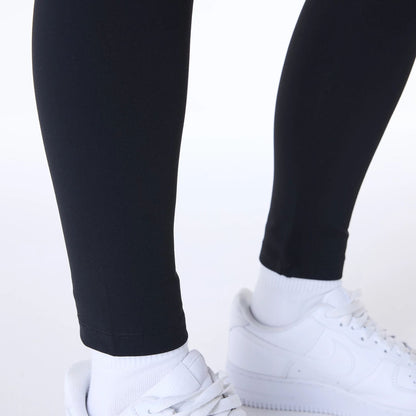 The Female model is wearing New York Yankees Womens MLB League Essential Black Leggings 5