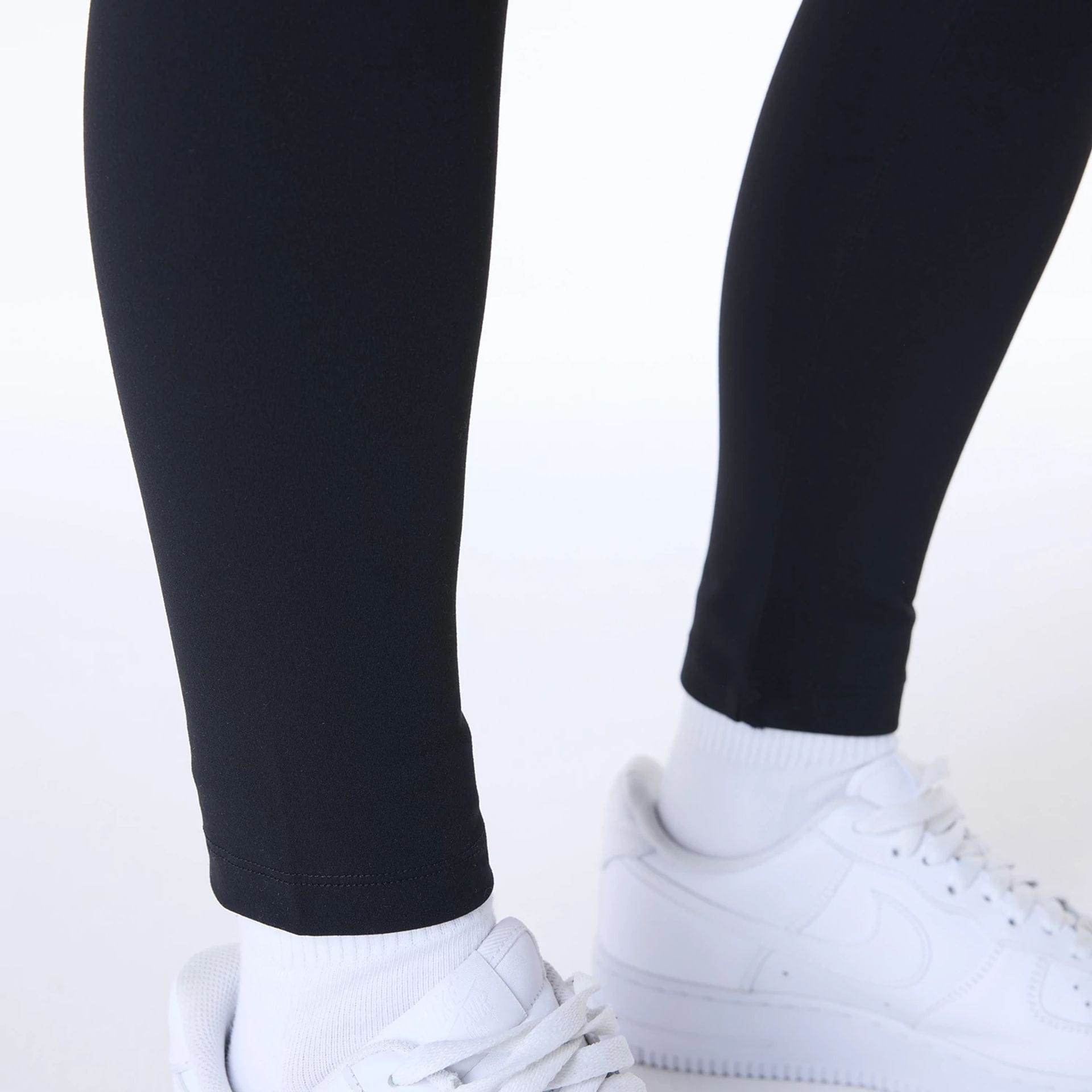 The Female model is wearing New York Yankees Womens MLB League Essential Black Leggings 5