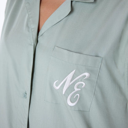 The Female model is wearing Womens New Era Revere Pastel Green T-Shirt 3