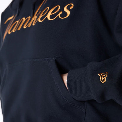 The Female model is wearing New York Yankees Womens MLB Graphic Black Pullover Hoodie 4