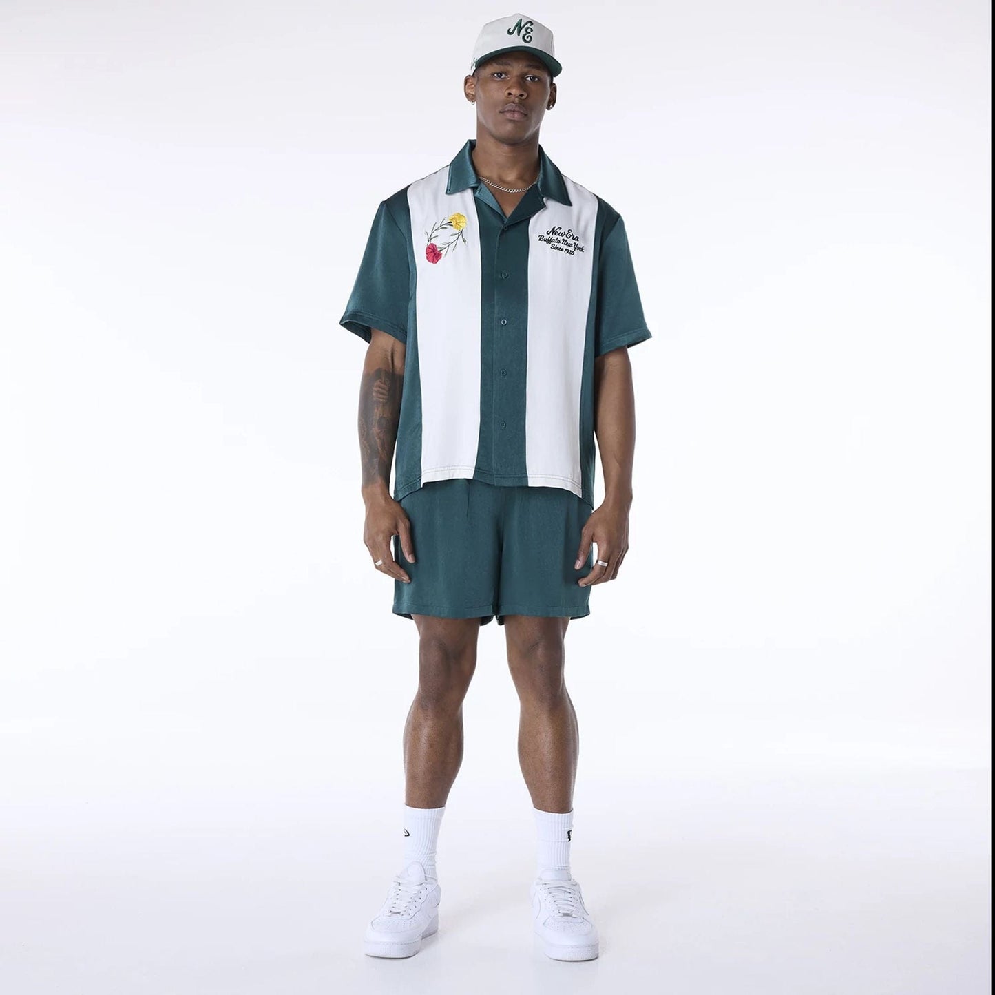 The Male model is wearing New Era Stripe Revere Dark Green Short Sleeve Shirt 3