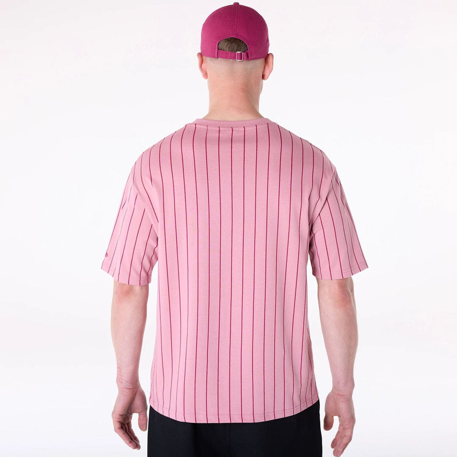 The Male model is wearing New Era Pinstripe Dark Pink Oversized T-Shirt 2
