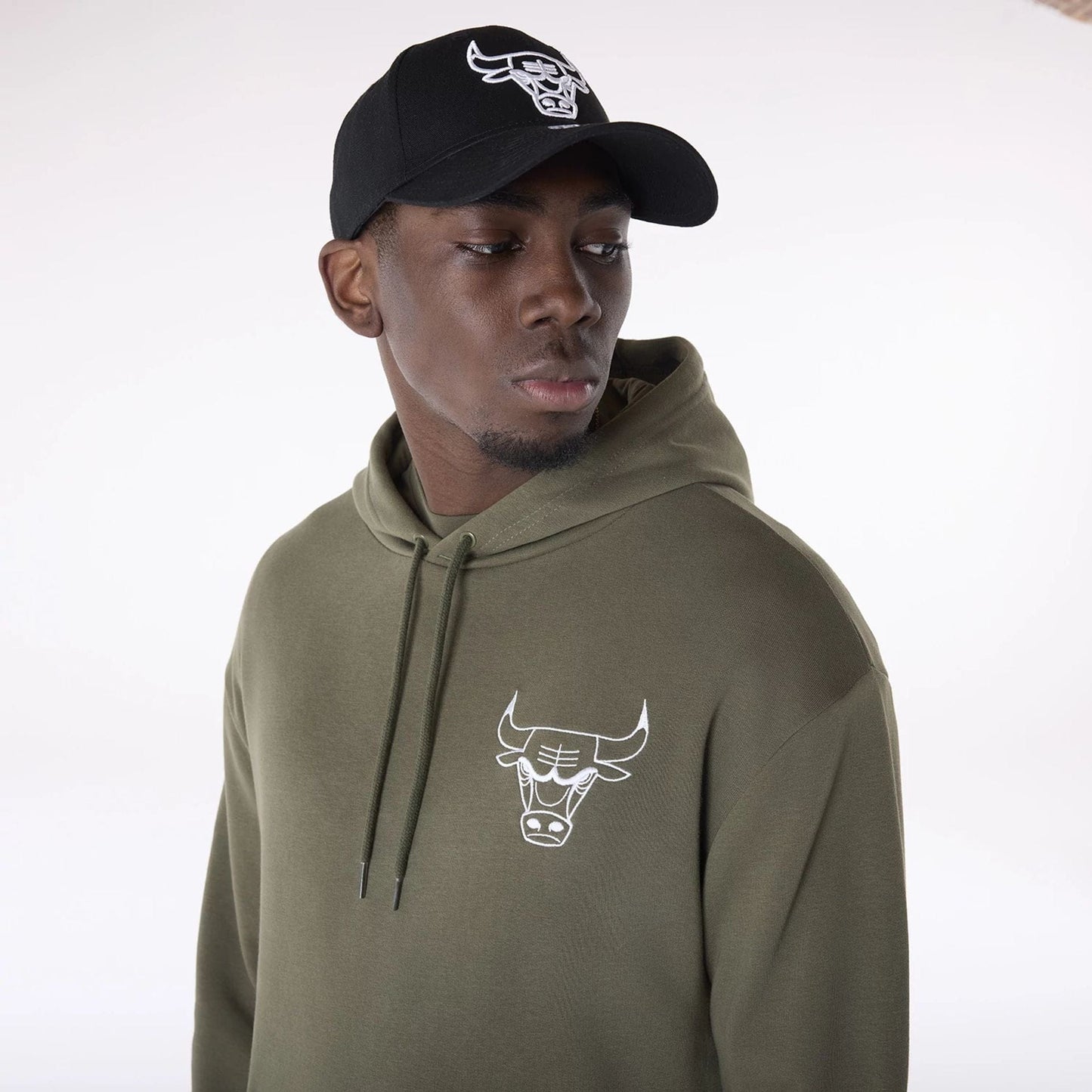 The Male model is wearing Chicago Bulls NBA League Essential Green Oversized Pullover Hoodie 5