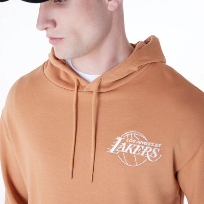 The Male model is wearing LA Lakers NBA League Essential Dark Beige Oversized Pullover Hoodie 3