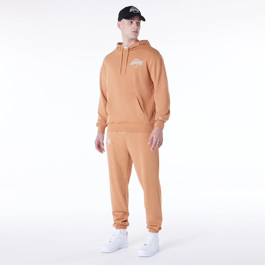 The Male model is wearing LA Lakers NBA League Essential Dark Beige Oversized Pullover Hoodie 7