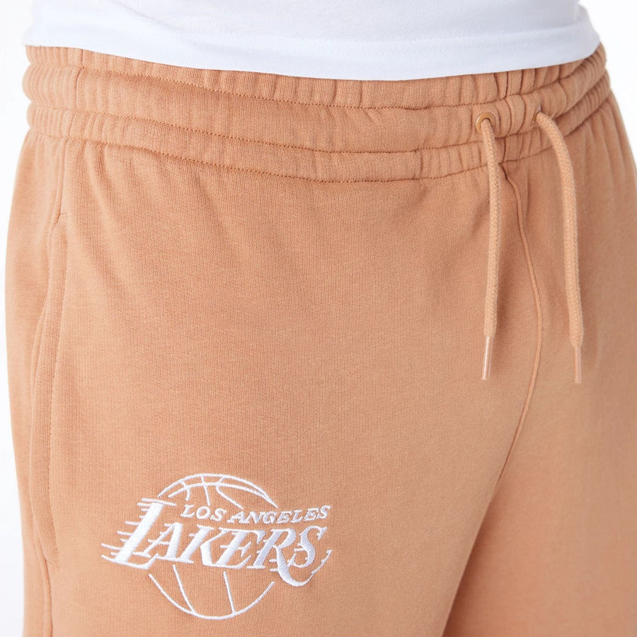 The Male model is wearing LA Lakers NBA League Essential Dark Beige Fleece Joggers 7