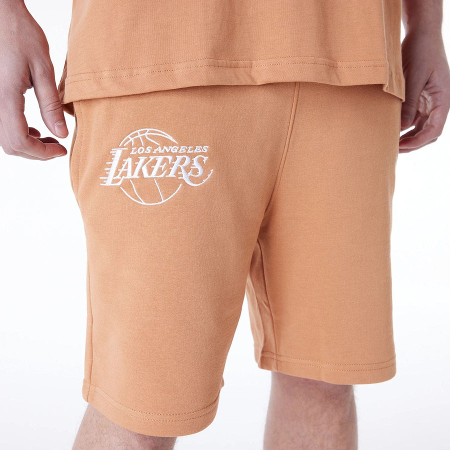 The Male model is wearing LA Lakers NBA League Essential Dark Beige Shorts 7