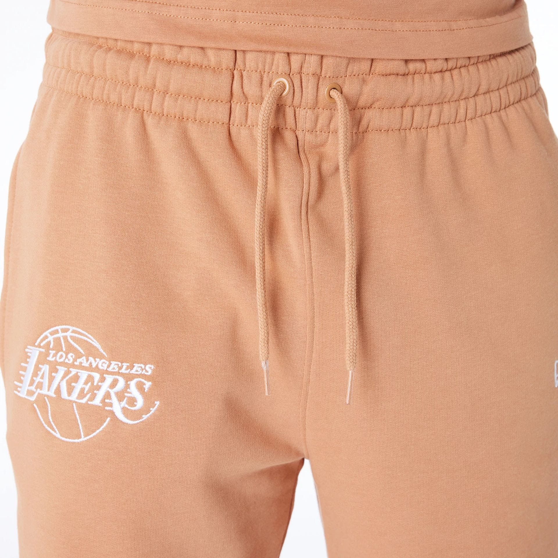 The Male model is wearing LA Lakers NBA League Essential Dark Beige Shorts 5