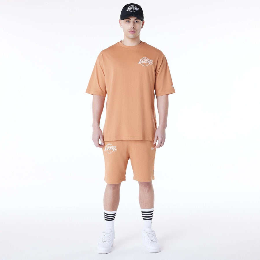 The Male model is wearing LA Lakers NBA League Essential Dark Beige Shorts 3