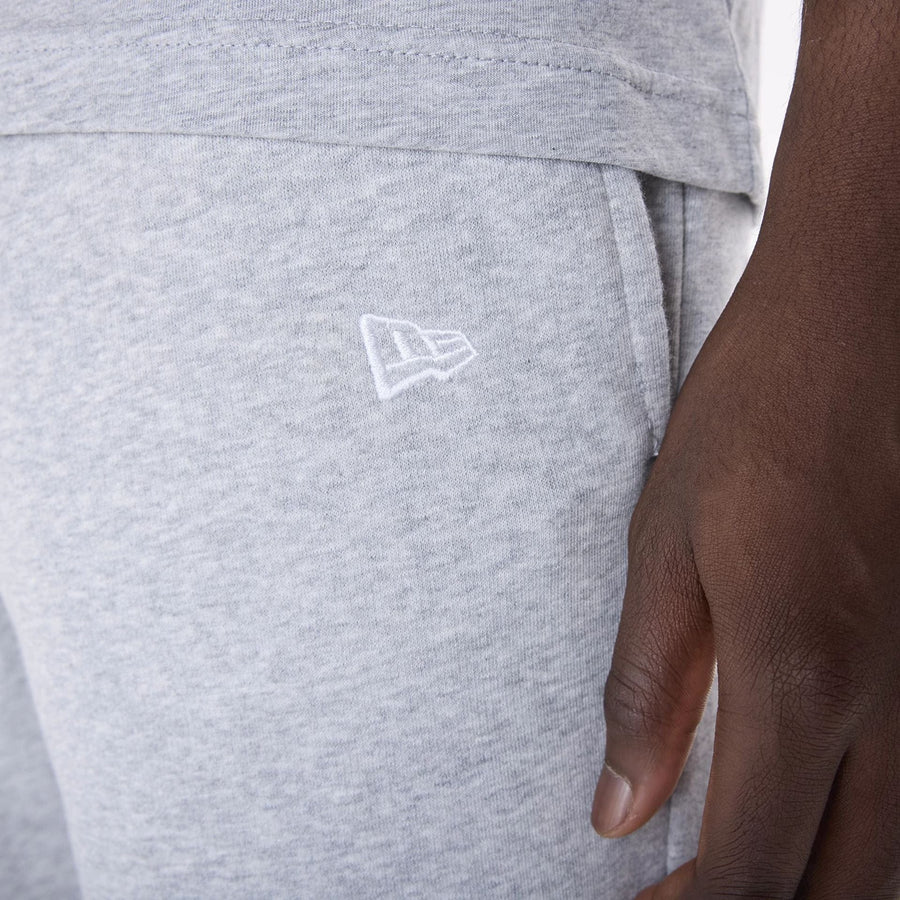 The Male model is wearing Brooklyn Nets NBA League Essential Grey Shorts 4