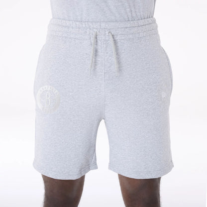The Male model is wearing Brooklyn Nets NBA League Essential Grey Shorts 5