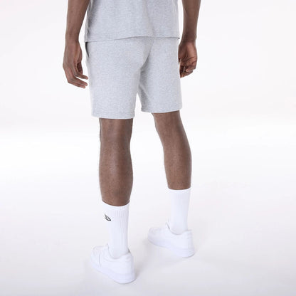 The Male model is wearing Brooklyn Nets NBA League Essential Grey Shorts 7