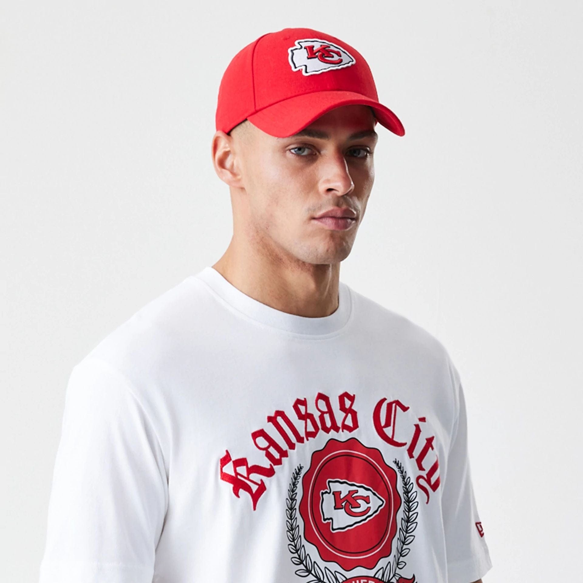The Male model is wearing Kansas City Chiefs Throwback Prep White T-Shirt 3