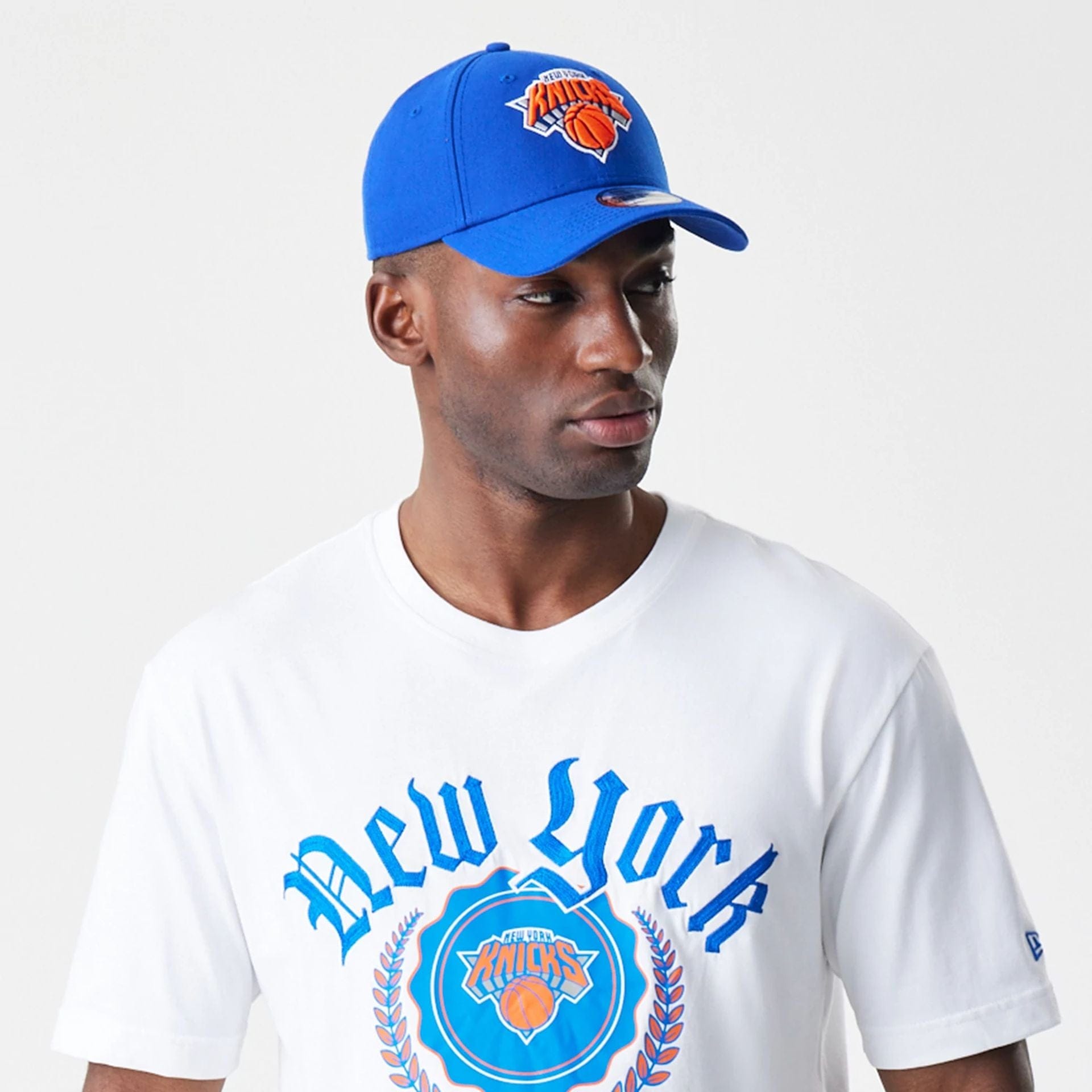 The Male model is wearing New York Knicks Throwback Prep White T-Shirt 3