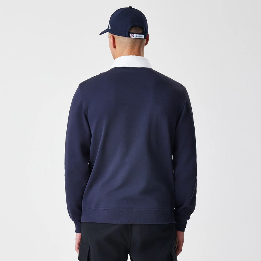 The Male model is wearing New York Yankees Throwback Prep Navy Long Sleeve Rugby Shirt 2