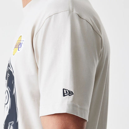 The Male model is wearing LA Lakers Modern Driver Light Beige T-Shirt 4