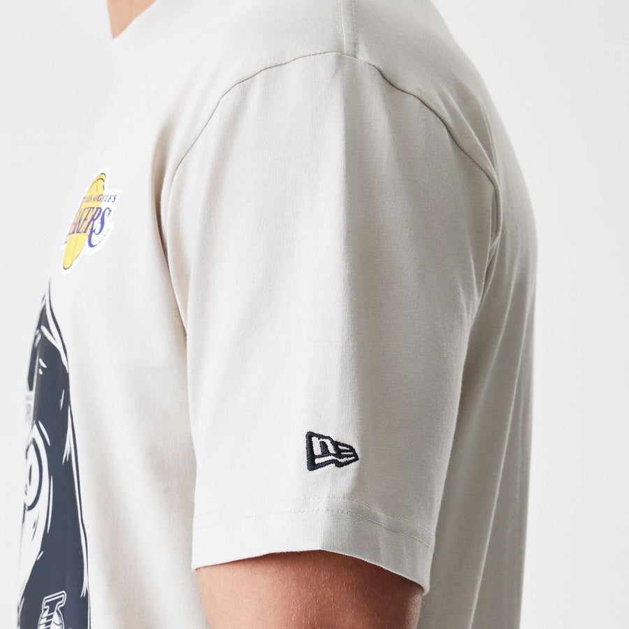 The Male model is wearing LA Lakers Modern Driver Light Beige T-Shirt 4