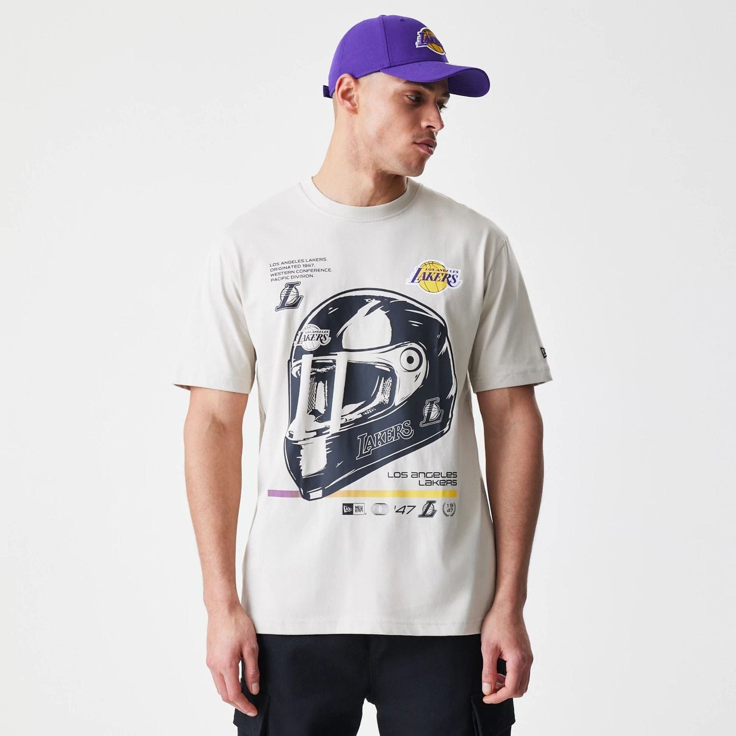 The Male model is wearing LA Lakers Modern Driver Light Beige T-Shirt 1
