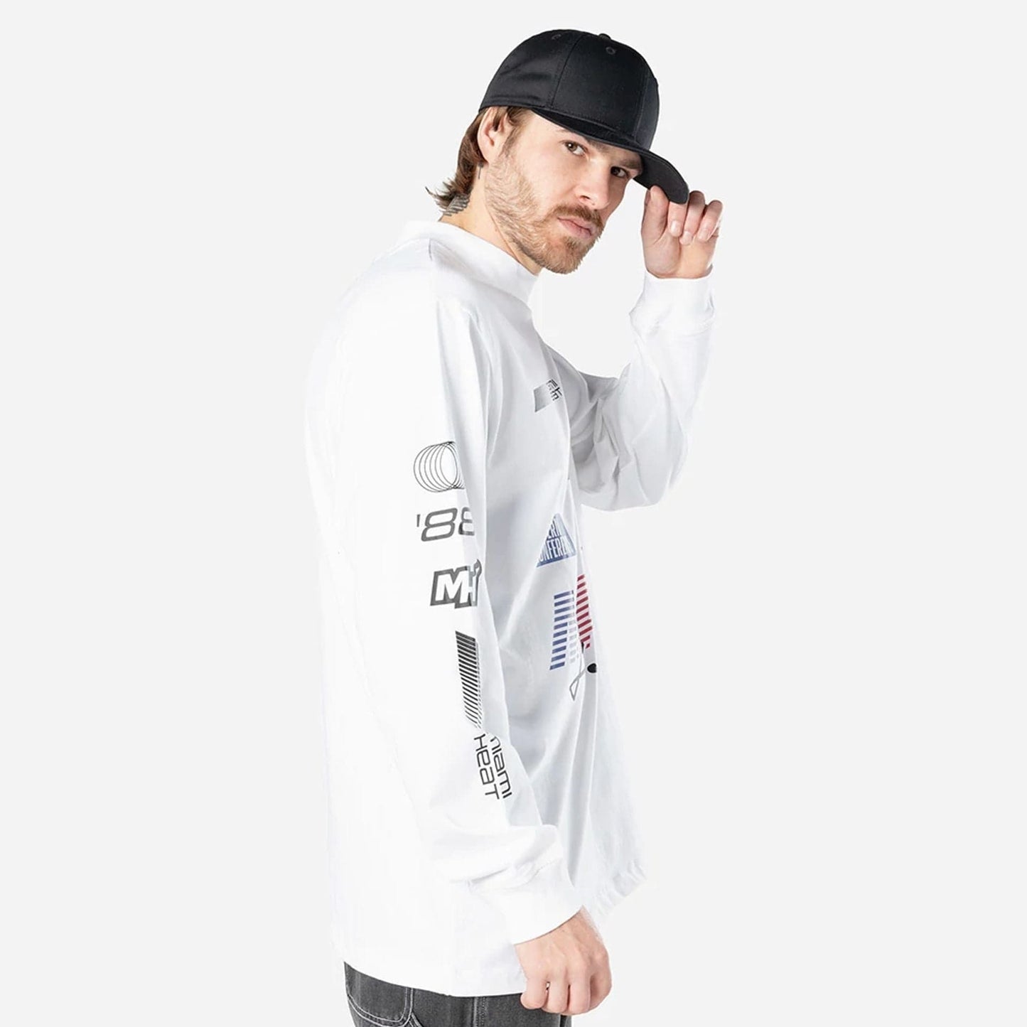 The Male model is wearing Miami Heat Modern Driver White Long Sleeve T-Shirt 4