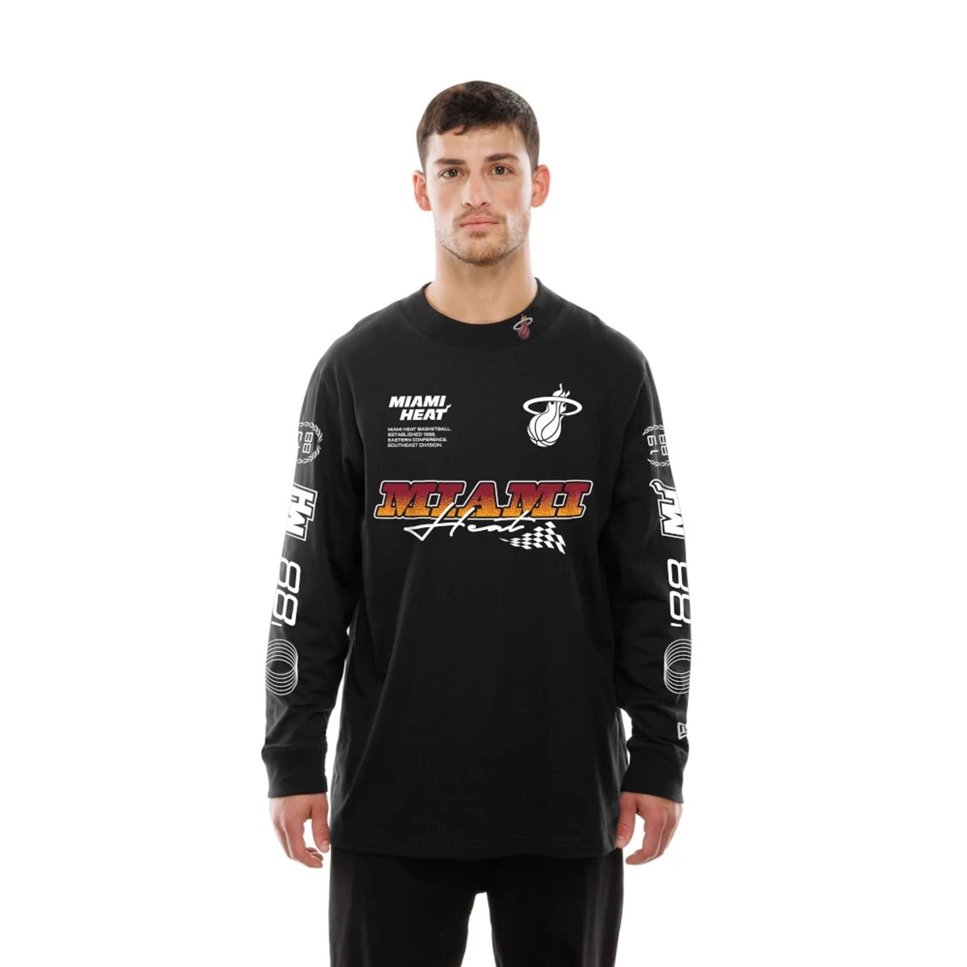 The Male model is wearing Miami Heat Modern Driver Black Long Sleeve T-Shirt 6